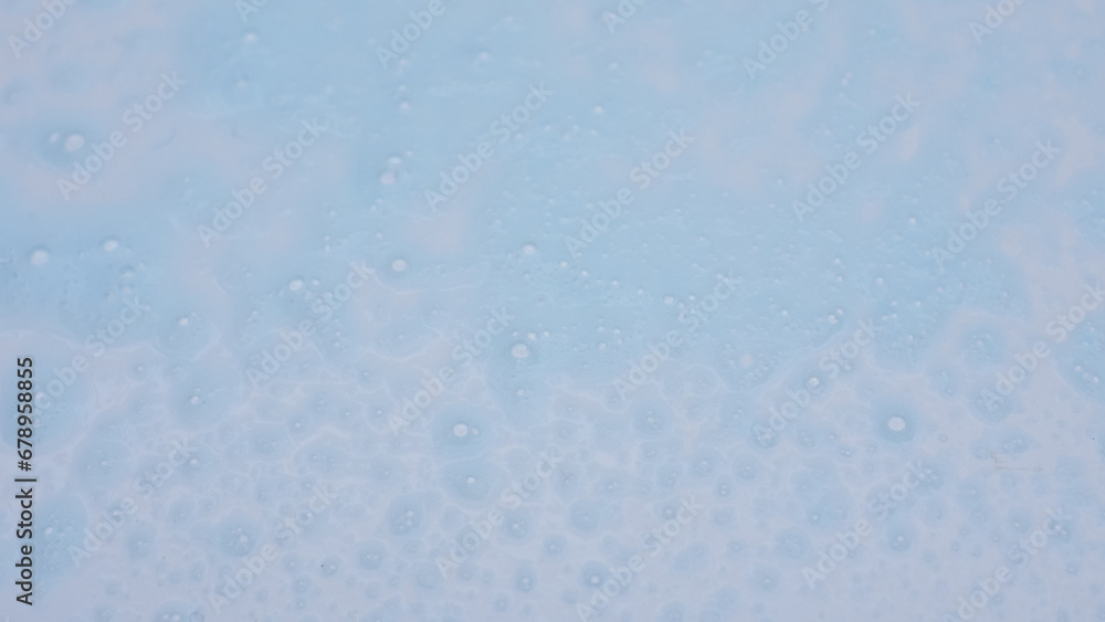 blue soap foam texture on white background blue soap foam texture on white background