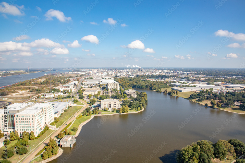 view from state capitol tower in Baton Rouge to capitol lake and industrial areas