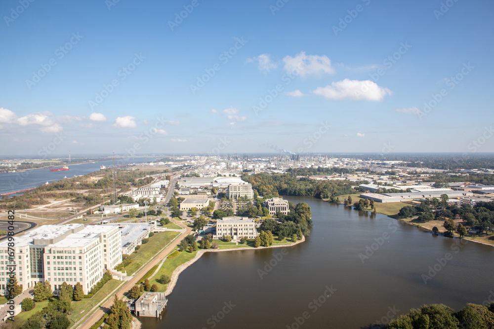 view from state capitol tower in Baton Rouge to capitol lake and industrial areas