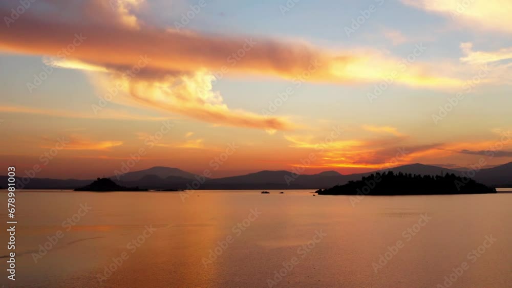DRONE DOLY SHOT OF PATZCUARO LAKE AND TECUENA ISLAND AT SUNSET DRONE DOLY SHOT OF PATZCUARO LAKE AND TECUENA ISLAND AT SUNSET