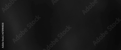 abstract smooth empty black studio well use as background and black abstract wall to display product. photo