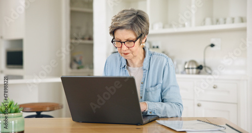 Home, laptop and senior woman reading website for asset management services, registration or planning retirement. Elderly person on computer of pension research, funding application or life insurance photo