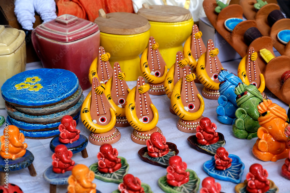 Beautiful traditional handicrafts, for sale during Handicraft Fair in Pune. Selective focus.