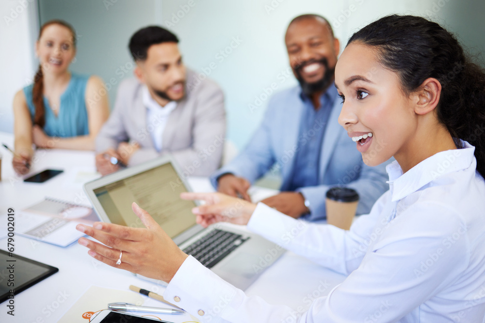 Businesswoman, teamwork and meeting for strategy in boardroom with laptop for online, report or document. Diversity, female boss or manager for leadership, training and guidance for collaboration