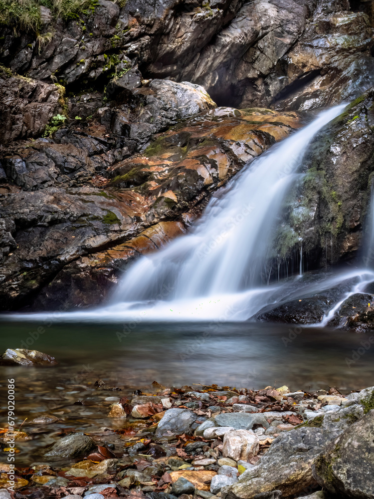 Fototapeta premium Waterfall in the Maria Valley ( Valea Mariii ) gorge, Hunedoara county, Romania
