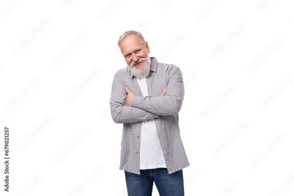 well-groomed senior man with a gray beard and mustache is dressed in a plaid shirt on a white background well-groomed senior man with a gray beard and mustache is dressed in a plaid shirt on a white background