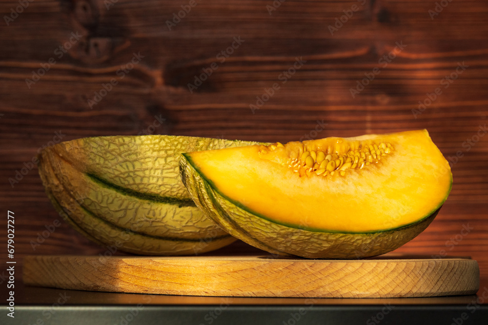 Orange melon harvested in the greenhouse of an organic fruit farm. Favorite fruits in summer.