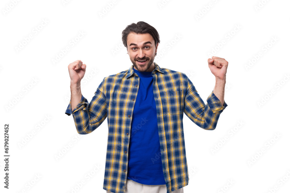 portrait of a young european brunette with a beard waving his arms wide portrait of a young european brunette with a beard waving his arms wide