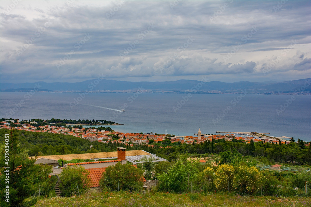 Supetar seen from the hills above the town on Brac Island, Dalmatia, Croatia. Looking towards the mainland close to Split