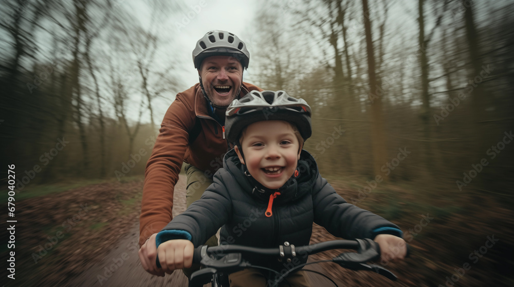 father and son cycling at outdoor