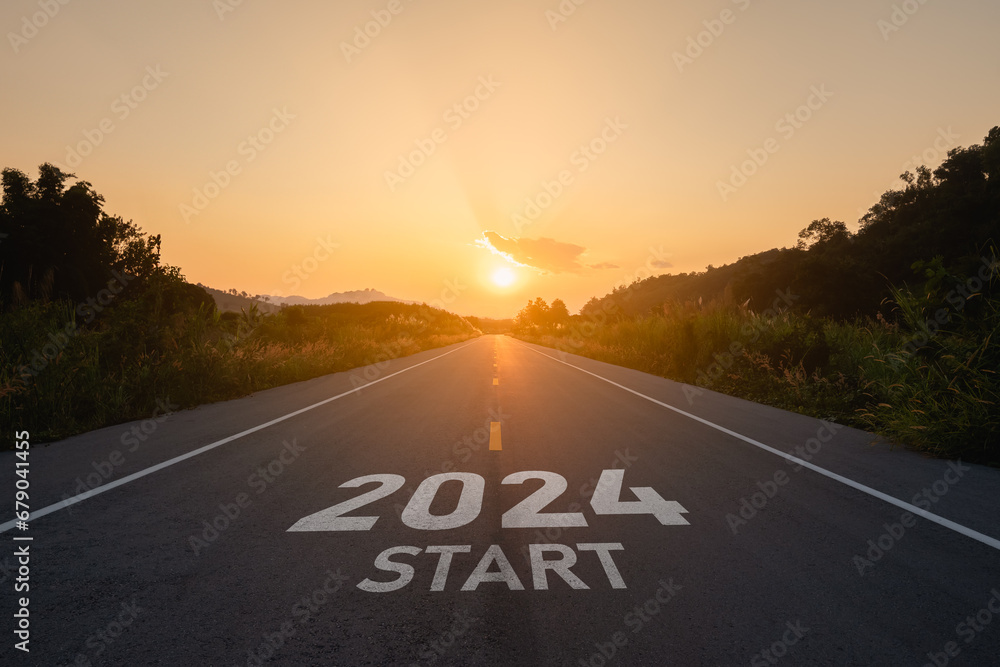 Happy new year 2024,2024 symbolizes the start of the new year. The letter start new year 2024 on the road in the nature route roadway sunset tree environment ecology or greenery wallpaper concept. - obrazy, fototapety, plakaty 