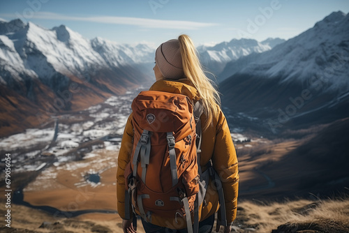 Hiker, trekking in high mountains. Stunning view. Beautiful landscape.