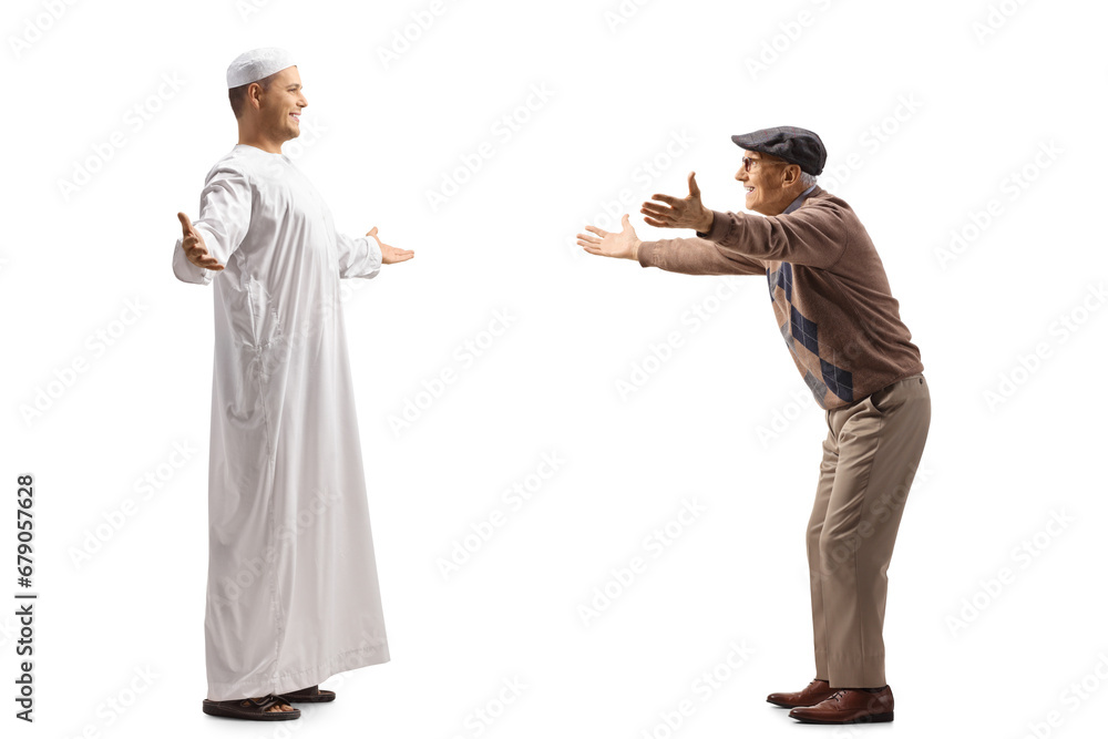 Excited elderly man waiting for a young man in muslim ethnic clothes Excited elderly man waiting for a young man in muslim ethnic clothes