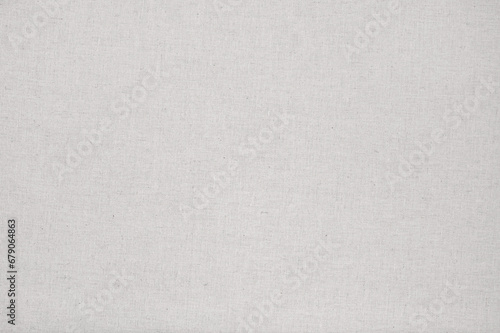 Soft plain linen fabric texture background in neutral earthy oat beige color