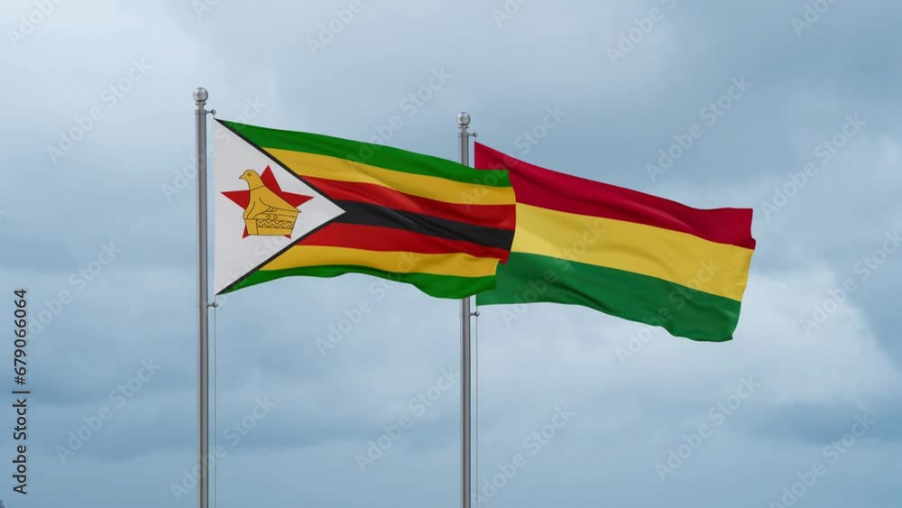 Bolivia flag and Zimbabwe flag waving together on cloudy sky, endless seamless loop, two country relations concept Bolivia flag and Zimbabwe flag waving together on cloudy sky, endless seamless loop, two country relations concept