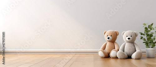 Two funny teddy bears on the floor of a room sitting beside ornamental grass in a pot, near the wall. Simple, minimalist photograph, template with large copyspace. photo