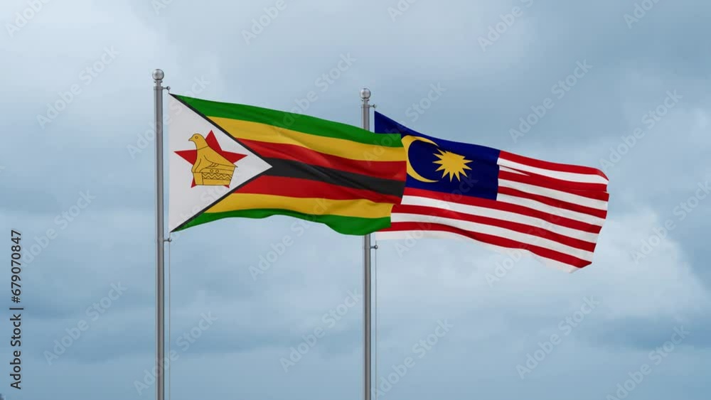 Malaysia and Zimbabwe flag waving together on cloudy sky, endless seamless loop, two country cooperation concept Malaysia and Zimbabwe flag waving together on cloudy sky, endless seamless loop, two country cooperation concept