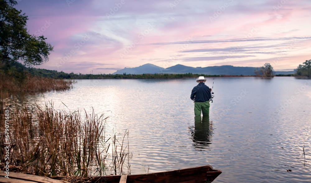 pond landscape in twilight with fisherman fishing on water in vocation day pond landscape in twilight with fisherman fishing on water in vocation day