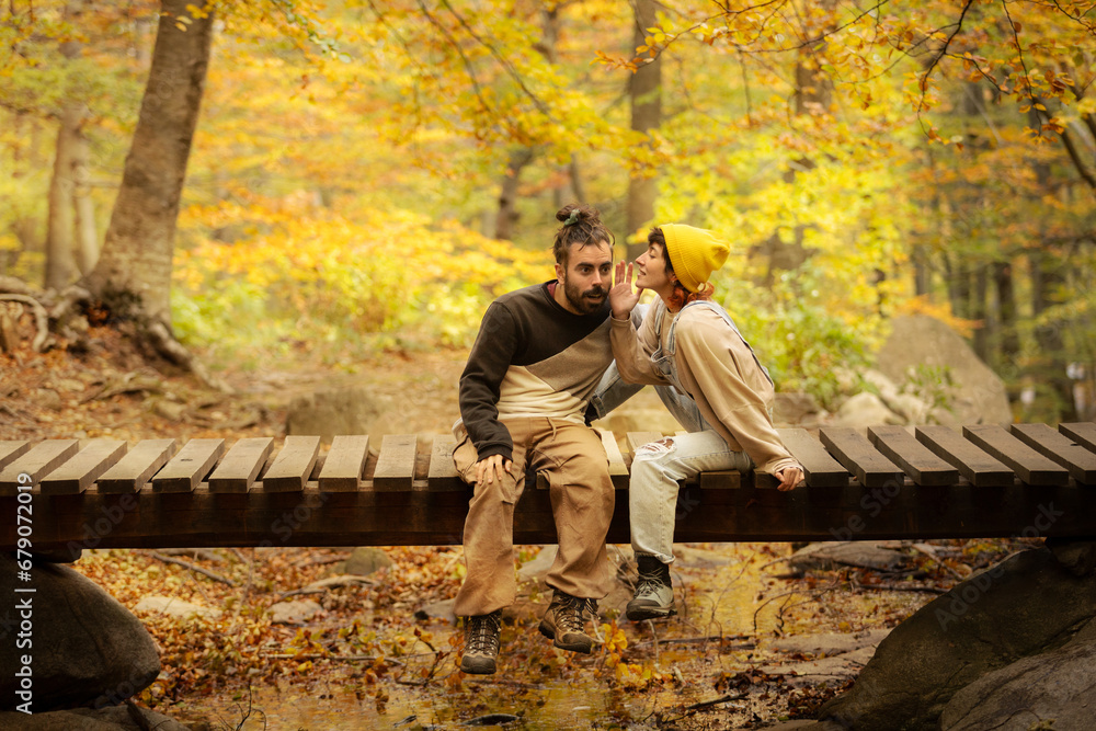 Fototapeta premium couple of man and woman talking, hugging, looking at each other,