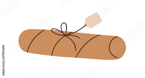 Holiday gift in kraft wrapping, twine and tag. Present wrapped in brown craft...