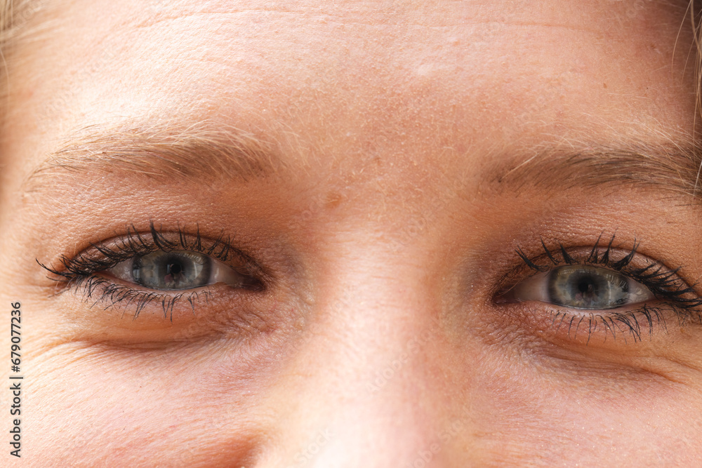 © Wavebreak Media - Eyes of happy blonde caucasian woman smiling in sunny living room at home © Wavebreak Media - Eyes of happy blonde caucasian woman smiling in sunny living room at home