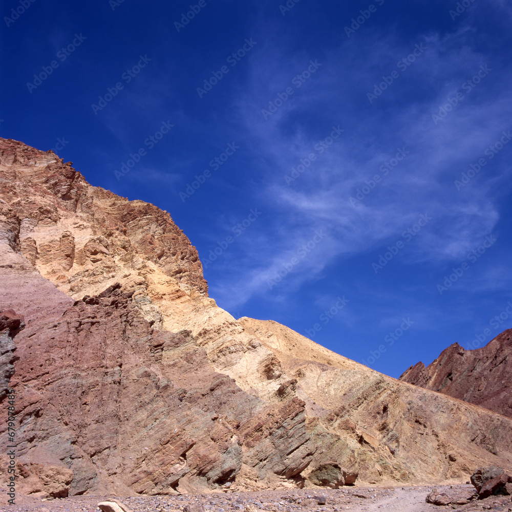 Dry hills without a single blade of grass and blue sky Dry hills without a single blade of grass and blue sky
