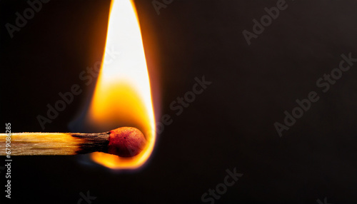 Macro photography of a burning match stick against black background