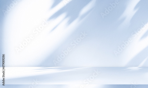 Empty studio interior background and backdrop and product display stand with shadow white and blue on blank text background for inserting text.	 photo