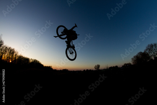 silhouette of a cyclist