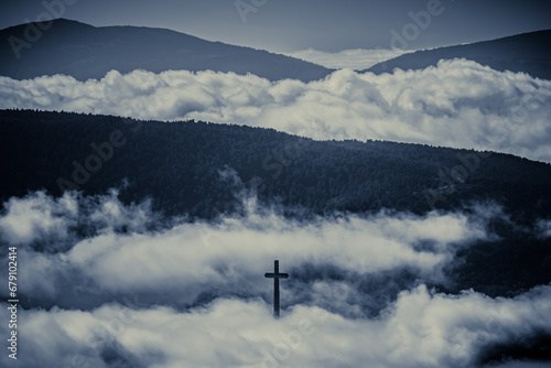 El Valle de los Caídos en Madrid, por encima de las nubes photo