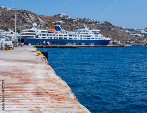 Port with ferryboat on Greek island Mykonos in Greece photo