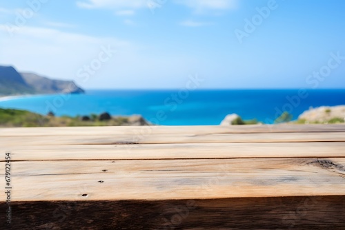 close up of a wooden table with ocean sea view in background