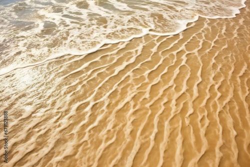 wave patterns on a sandy beach