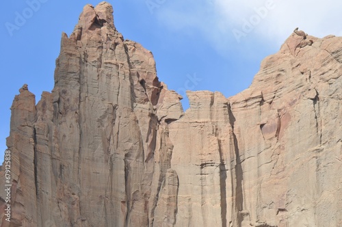 Scenic view of Shiprock against the backdrop of a blue sky, New Mexico photo
