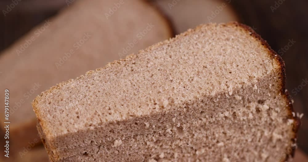 black rye loaf of rectangular bread, fresh bread using a mixture of wheat and rye flour black rye loaf of rectangular bread, fresh bread using a mixture of wheat and rye flour