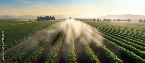 High quality drone photo of potato field with impressive irrigation system Copy space image Place for adding text or design photo