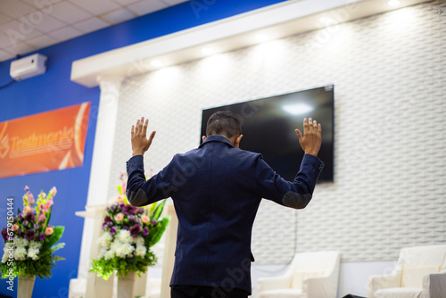 man hands up liberation church worship