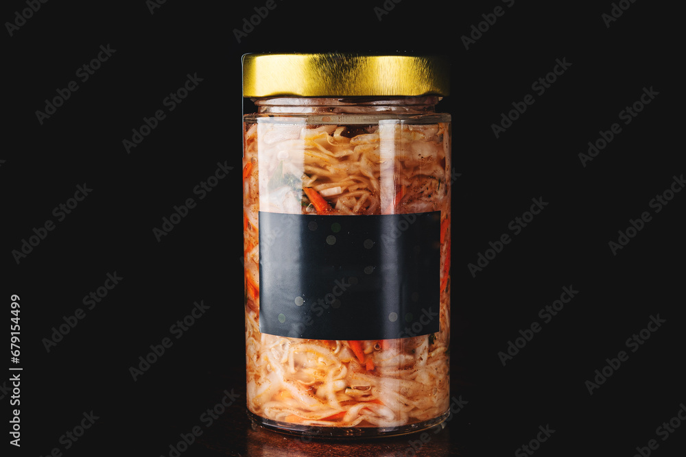 cabbage salad in a glass jar on black cabbage salad in a glass jar on black