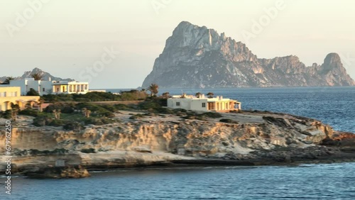 Aerial video of an idyllic place with Es Vedra in the background. photo