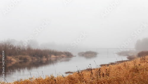 Autumn landscape. The river in the fog. Autumn landscape.