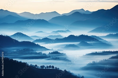 Beautiful landscape of mountains in foggy morning. Beauty in nature. © Rudsaphon