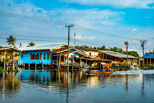 Photography Longtail Boat Riding in a Canal Village