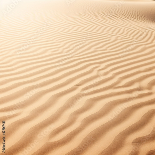 fotografia con detalle y textura de arena de tonos dorados con pequeñas ondulaciones propias de las dunas © Iridium Creatives