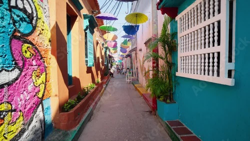 Walking the streets of the old Spanish colonial Unesco Heritage old town of Cartagena , South America tourist attraction. Getsemani district and downtown

