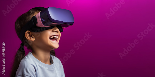 Young girl getting experience using VR headset glasses isolated on a blue background with copy space