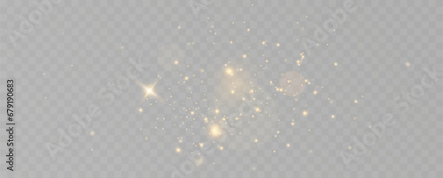 Golden sequins glow with many lights. Glittering dust. Luxurious background of golden particles.