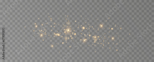 Golden sequins glow with many lights. Glittering dust. Luxurious background of golden particles.