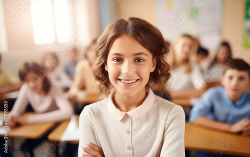 Smiling young teacher in a class