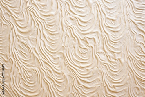 swirl patterns on a frothy milkshake surface