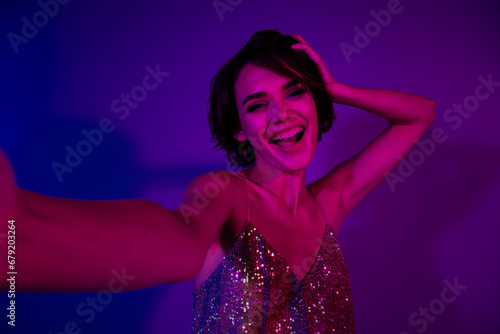 Photo of stunning lady enjoy valentine day occasion streaming in night club isolated neon color background